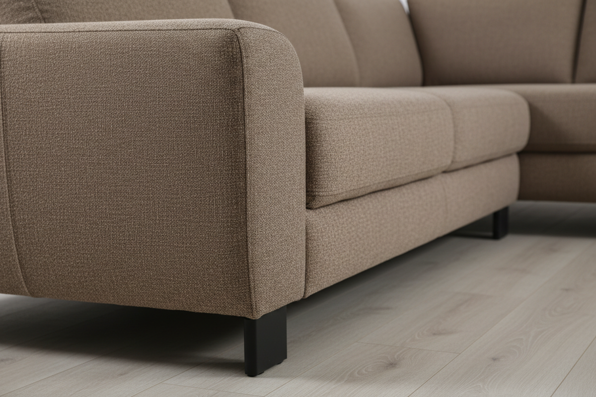 Fabric cushion and black leg close-up