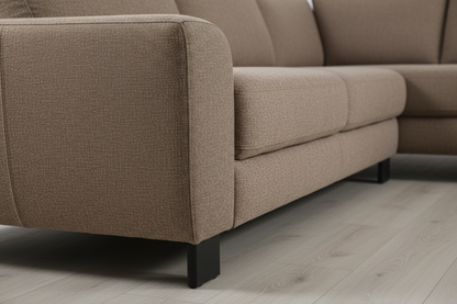Fabric cushion and black leg close-up