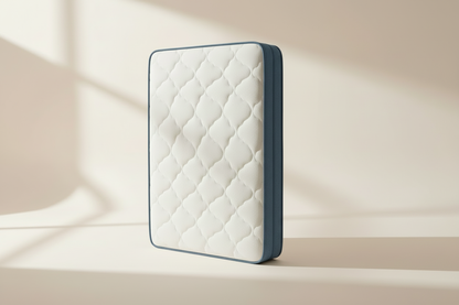 Side profile of the Novera Comfort Hybrid Mattress showing its quilted edge