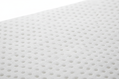 Natural latex topper close-up showing pinhole texture