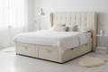 Novera Cream Wingback Divan Bed with tall headboard and drawer storage, white bedroom