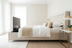Novera Cream Velvet TV Bed with motorised TV rising from footboard, bright luxury bedroom
