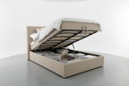 Linen ottoman bed gas-lift base open revealing under-bed storage