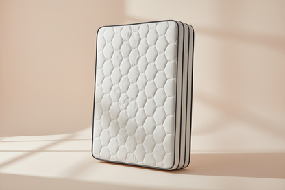 Novera Premium Hybrid Mattress with a quilted white cover, charcoal piping and taller profile on a warm white studio background
