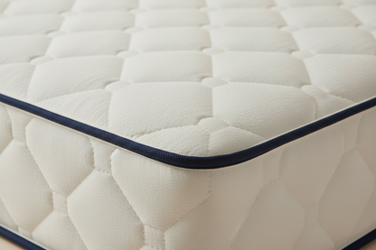 Close-up of the quilted cover and navy piping on the Novera Firm Support Orthopaedic Mattress