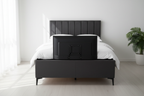 Charcoal chenille TV bed front view, motorised TV raised from footboard, white bedroom