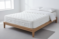 Novera Open Coil Spring Mattress on bed frame